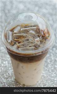 Iced coffee. Iced coffee in plastic cup for take aways