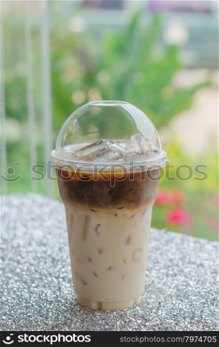 Iced coffee. Iced coffee in plastic cup for take aways