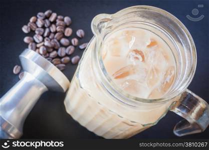 Iced coffee latte on barista work table , stock photo