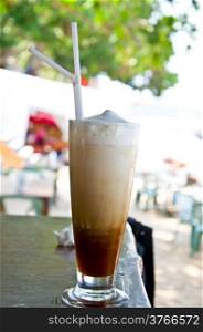 iced coffee on the beach for relaxation