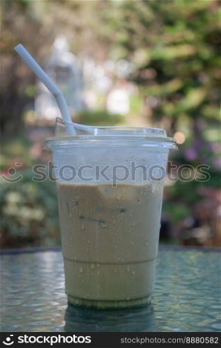 Iced coffee with nature background, stock photo