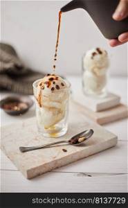 Iced coffee with vanilla ice cream called affogato in Italy.  . Iced coffee with vanilla ice cream. 