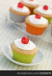 Iced Cup Cakes with Glace Cherries