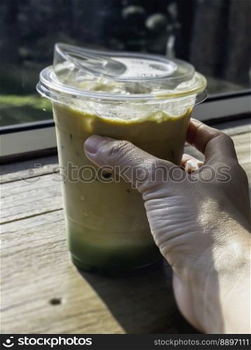 Iced drink in plastic container, stock photo