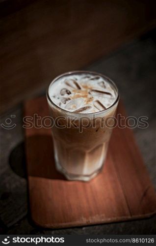 iced latte coffee in a glass with cold milk.  . iced latte coffee