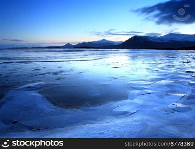 Iceland in twilight over the mountain range nd lakes