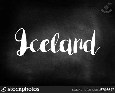 Iceland written on a blackboard