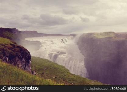 Icelandic dramatic landscapes with waterfall