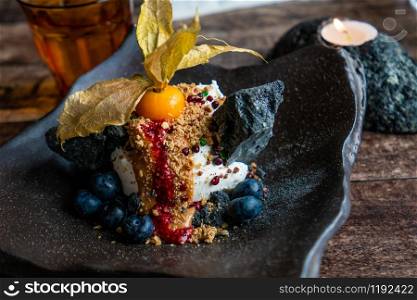 Icelandic ice cream menu with volcanic rock sugar cane and blueberries.
