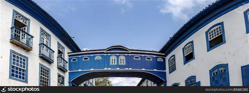 Icon of ancient colonial architecture in Diamantina in the state of Minas Gerais, Casa da Gloria with its suspended walkway connecting two historic houses. Icon of ancient colonial architecture in Diamantina in the state of Minas Gerais