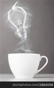 idea. bulb silhouette from steaming hot coffee cup