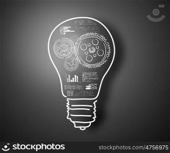 Idea concept. Conceptual image with light bulb and cogwheels on gray backdrop