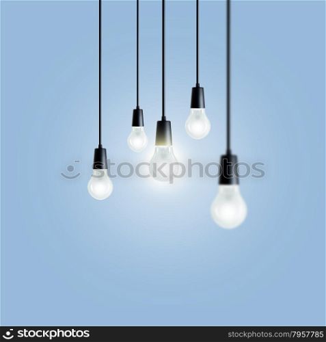 Idea concept. Light bulbs on blue background.