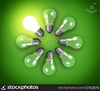 Idea concept with circle of light bulbs and glowing bulb