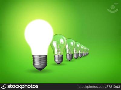 Idea concept with light bulbs on green