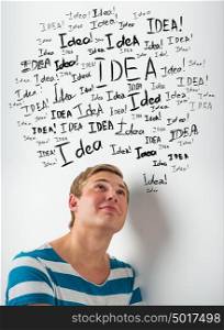 Idea concept. Young man with idea signs overhead