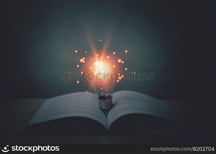 Idea creativity innovation inspiration strategy solution success business concept. light bulb on book at table.