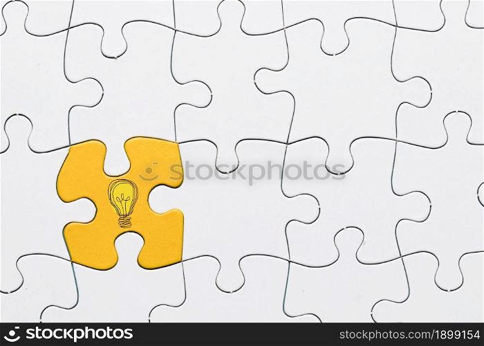idea icon yellow puzzle piece connected with white grid puzzle backdrop. Resolution and high quality beautiful photo. idea icon yellow puzzle piece connected with white grid puzzle backdrop. High quality beautiful photo concept