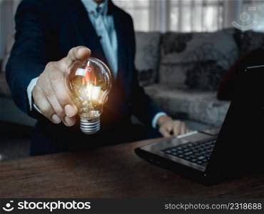 idea light bulb rocket on business man hand , business idea concept