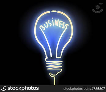 Idea of success. Glowing light bulb on dark background with word inside