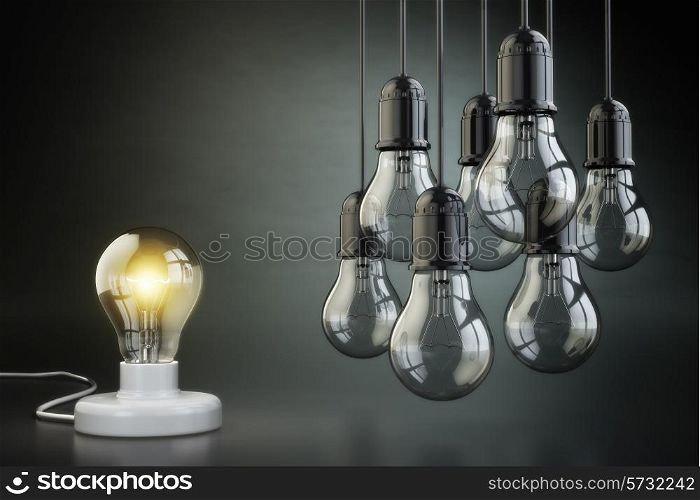 Idea or leadership concept. Group of lightbulbs on the black background. 3d