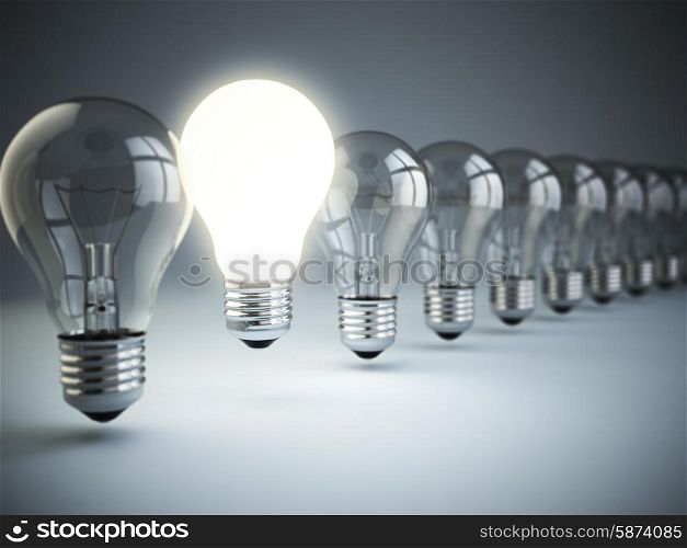 Idea or uniqueness, originality concept. Row of light bulbs with glowing one on blue background, 3d