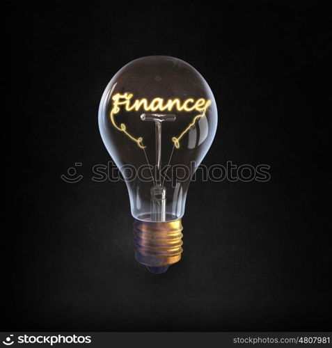 Ideas for business. Glowing glass light bulb with word finance inside