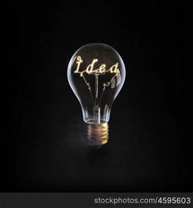 Ideas for business. Glowing glass light bulb with word idea inside
