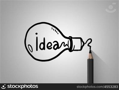 Ideas outline. Idae concept image with pencil drawing light bulb