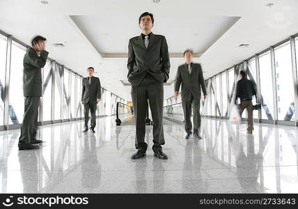 identical men on footbrige 2