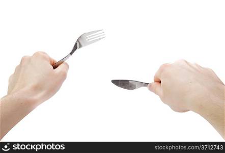 Idolated human hands with dinner equipments