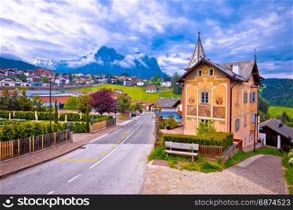 Idyllic Alpine town of Kastelruth architecture and mountains view, Trentino Alto Adige region of Italy