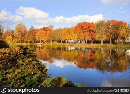 Idyllic autumn scenery of the Lazienki Royal Park in Warsaw, Poland