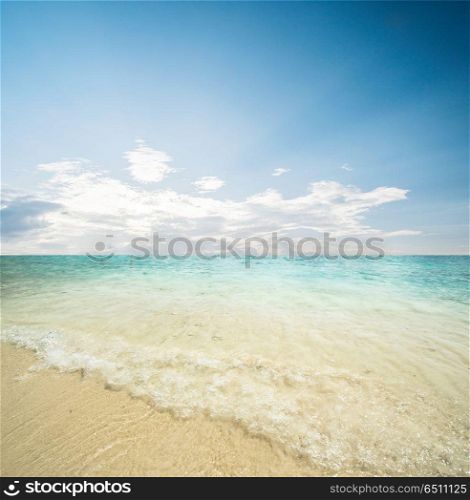 Idyllic beach and sea. Idyllic beach and sea, tropical summer landscape. Idyllic beach and sea