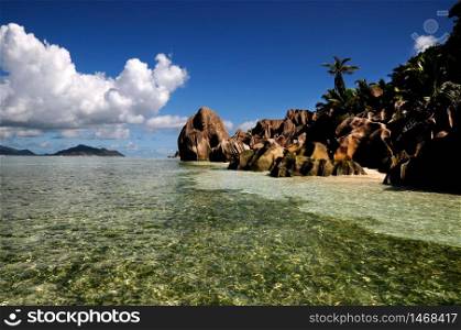 Idyllic beach with granitic rocks in Anse Gaulettes, La Digue island, Seychelles