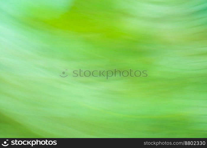 Idyllic day in sunny forest blur effect. Amazing landscape beauty of nature backdrop. Landscape at sunset time.. Background with colorful blurry effect landscape. Long exposure landscape blur photography.