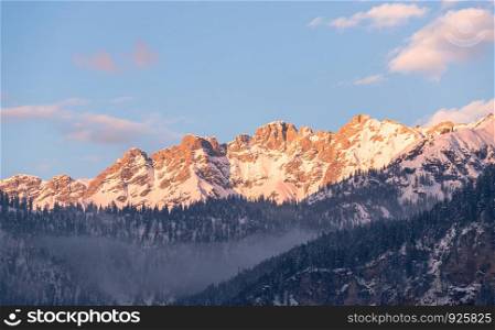 Idyllic scenery with snowy mountains in the evening sun, Alps, Austria