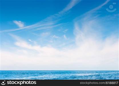 Idyllic scenery with white skies over the blue ocean
