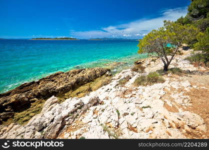 Idyllic turquoise rocky beach landscape view in Zadar riviera, Pakostane in Dalmatia region of Croatia
