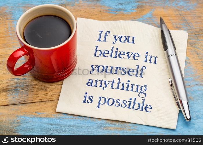 If you believe in yourself anything is possible - handwriting on a napkin with a cup of espresso coffee