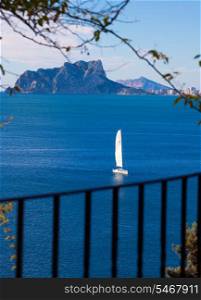 Ifach Penon view of calpe and Sailboat from Moraira in Mediterranean Alicante at Spain