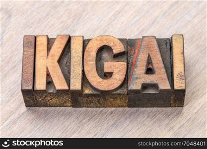 ikigai - Japanese concept of a reason for being or a reason to wake up - word abstract in vintage wood type