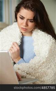 Ill Woman Looking Up Symptoms On Computer