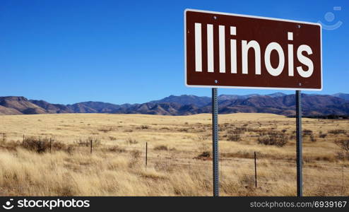 Illinois road sign with blue sky and wilderness