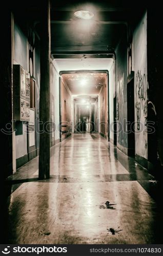 illuminated and empty hallway of the former barracks