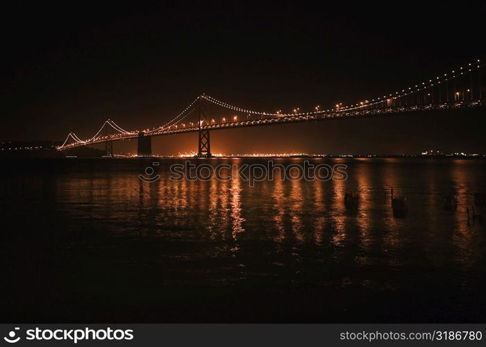 Illuminated bridge at night, Golden Gate Bridge, San Francisco, California, USA