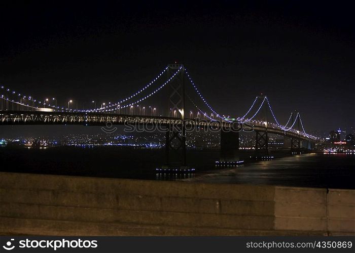 Illuminated bridge at night, Golden Gate Bridge, San Francisco, California, USA