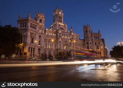 Illuminated Cibeles Palace at twilight, Madrid, Spain