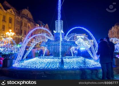 "Illuminated fountain known as "The fish fountain". Long exposure."