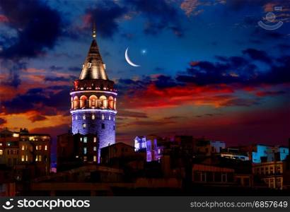 Illuminated Galata Tower in Istanbul at night, Turkey